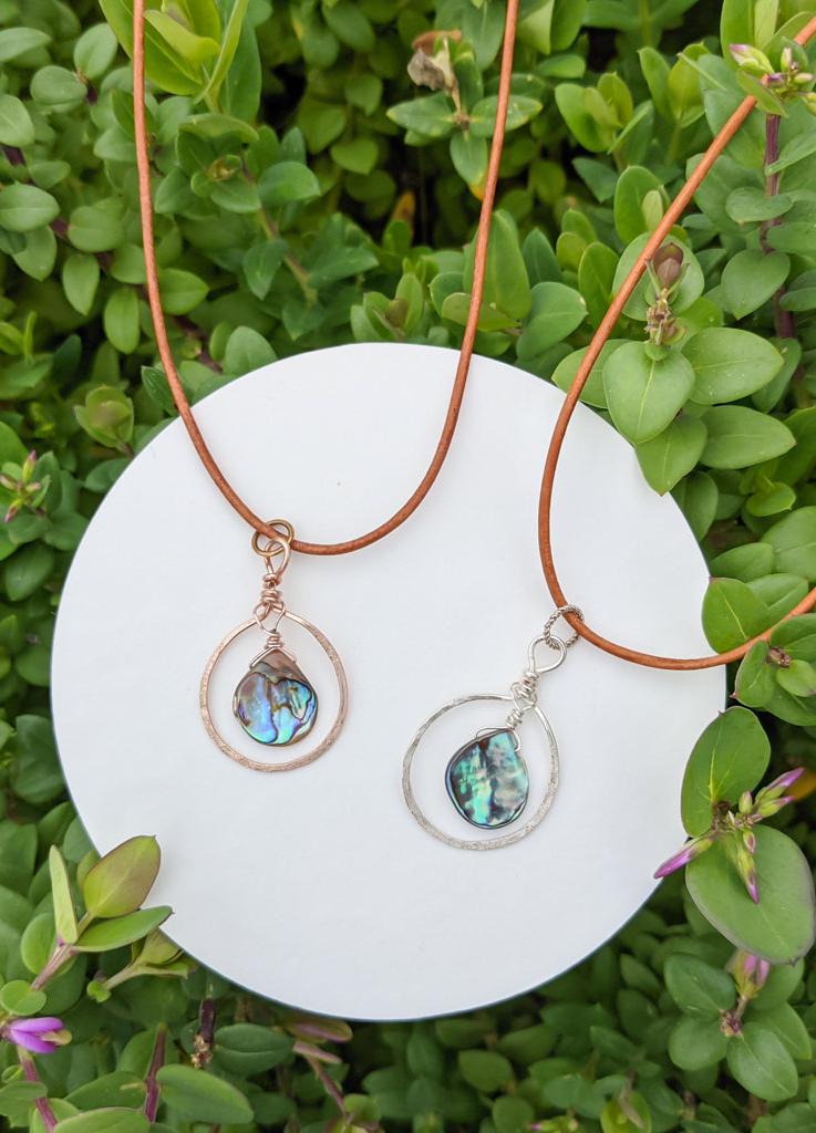 two abalone necklaces